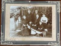 Old family photo on cardboard