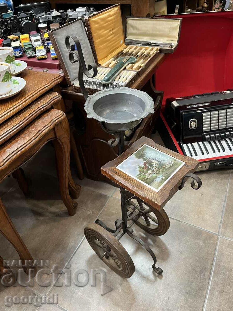 Tall ashtray with stand and wheels. #5874