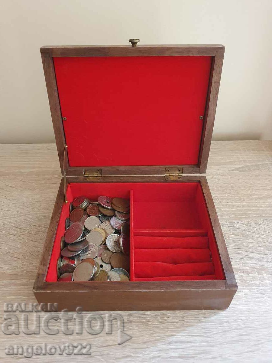 A wooden jewelry box with about 150 coins!