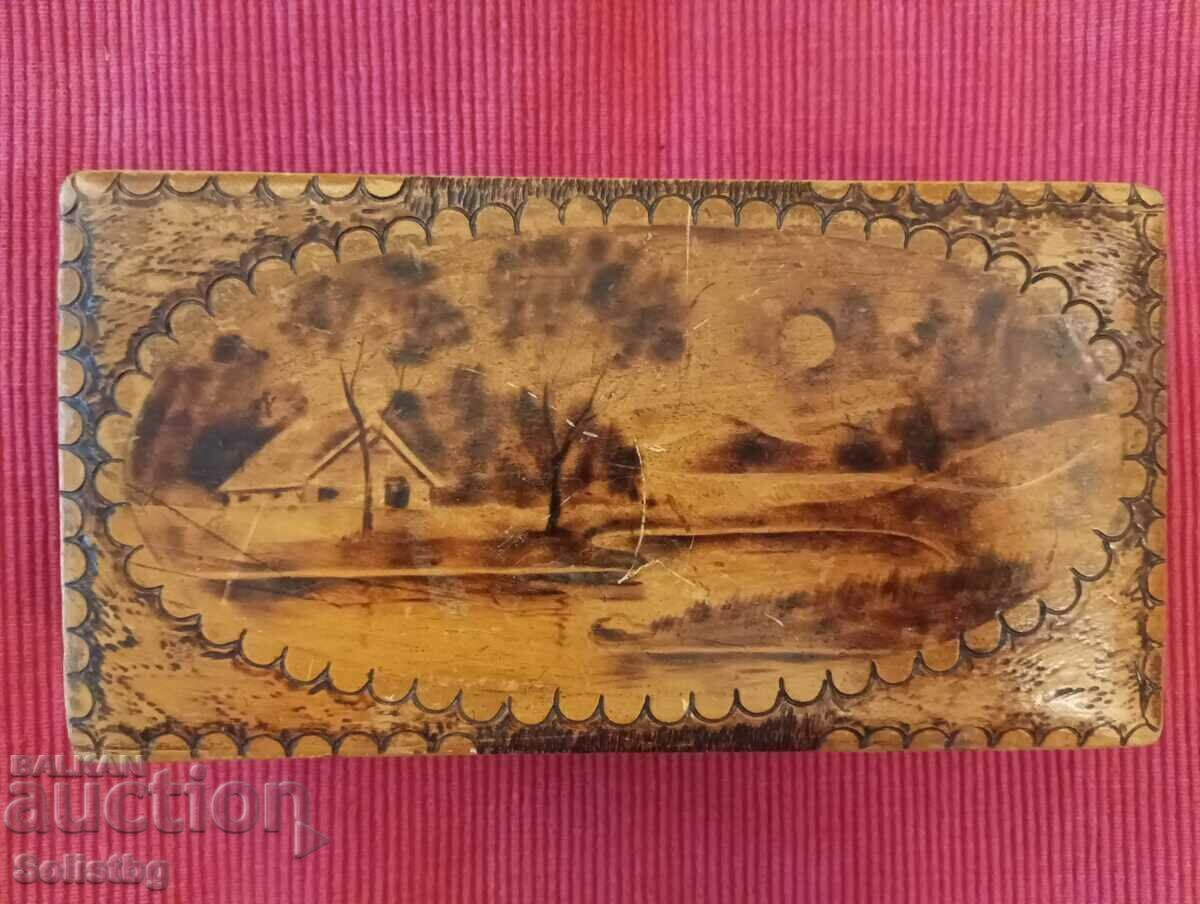 Old pyrographed wooden box. Old pyrographed wooden box.