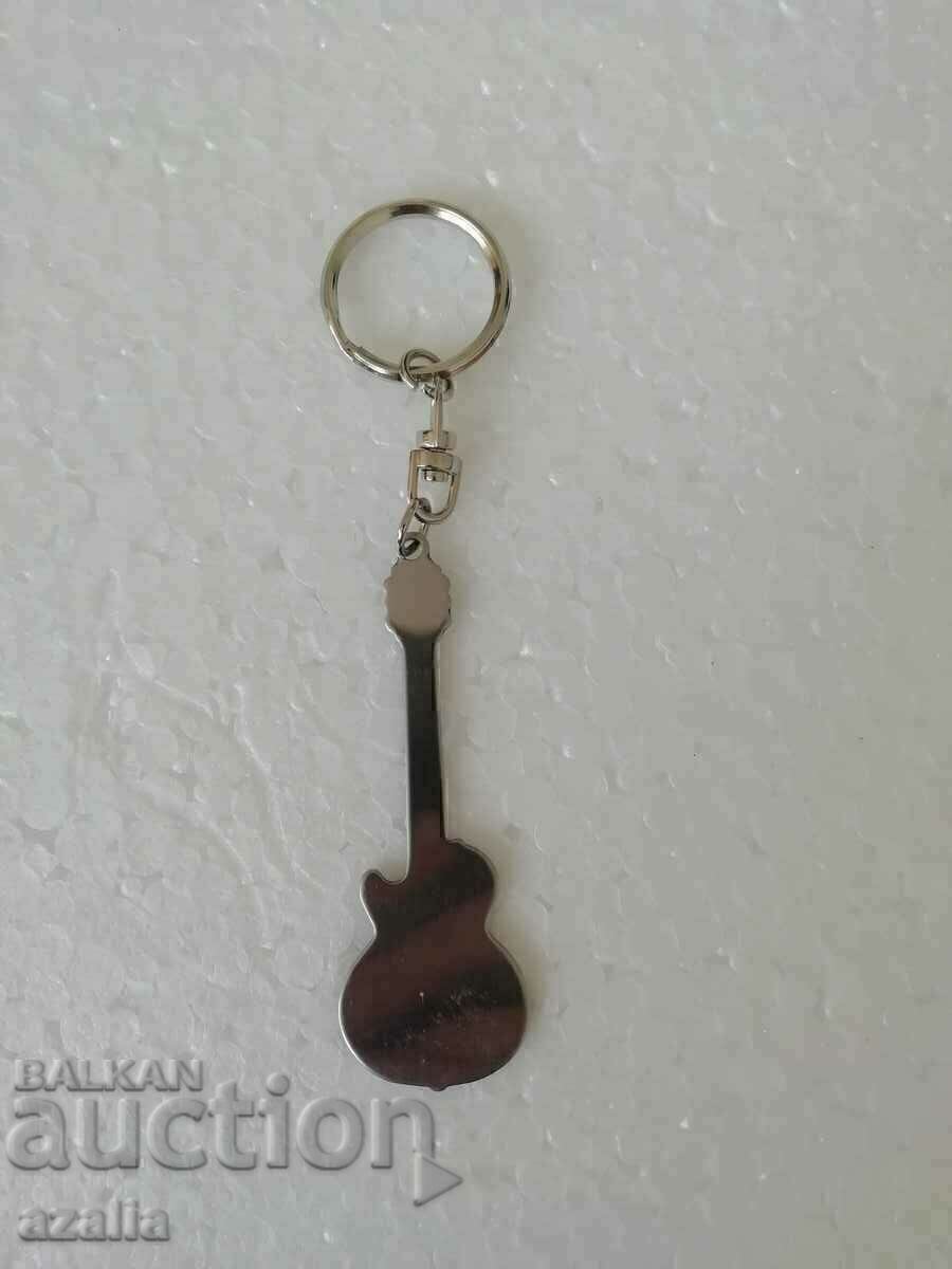 Δημοπρασία Πολύχρωμο μπρελόκ κιθάρας