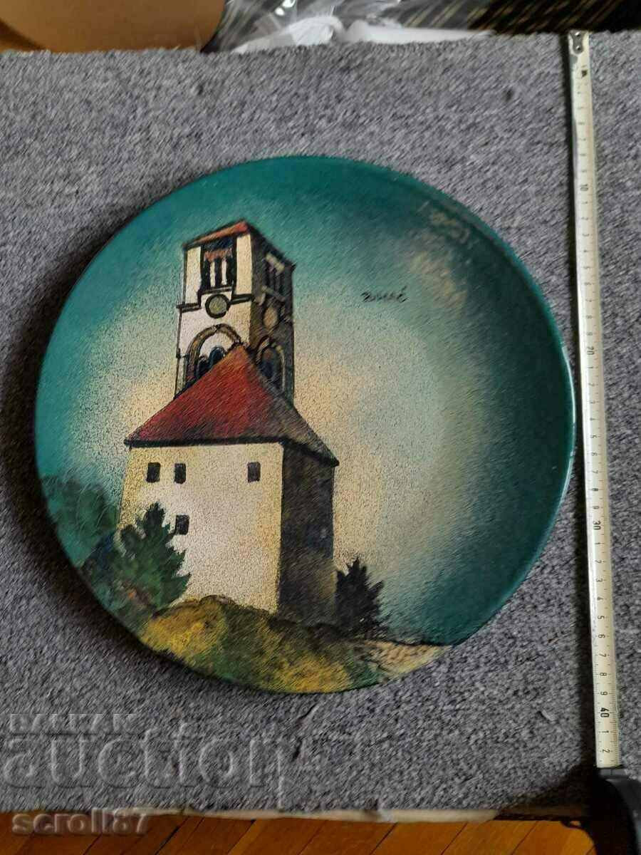 Beautiful painting on a round enamel plate