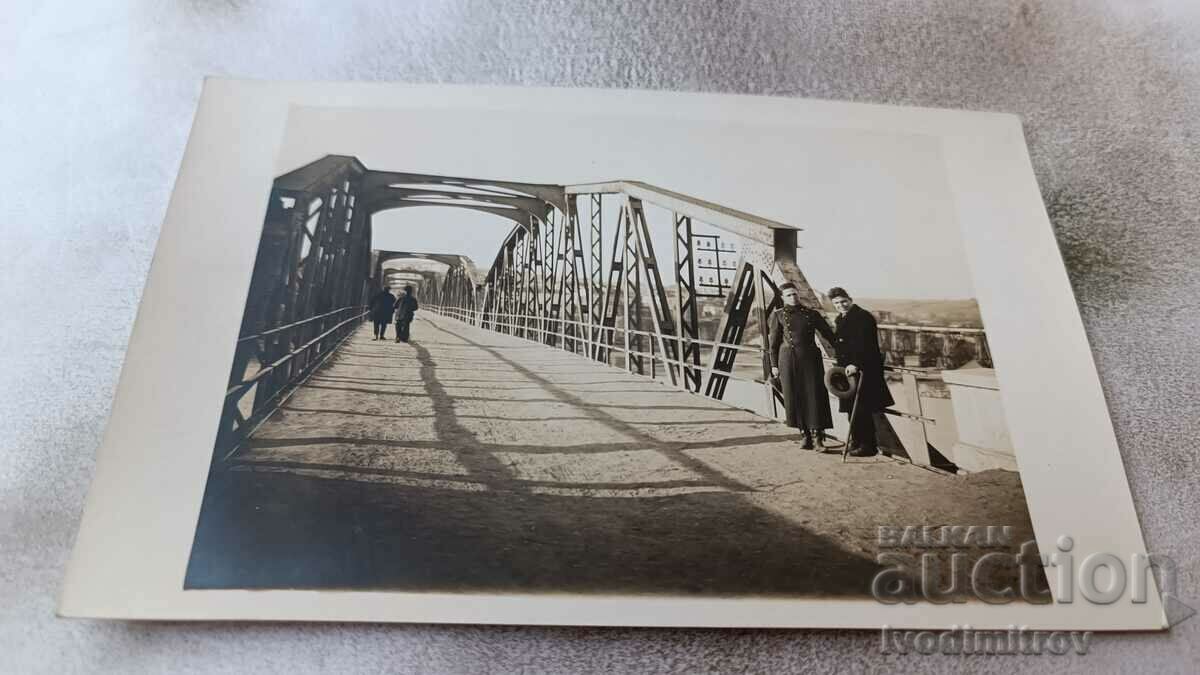 Photo Simeonovgrad Officetep and a man on a bridge over the Maritsa river