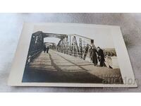 Photo Simeonovgrad Officetep and a man on a bridge over the Maritsa river