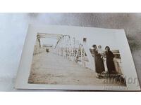 Photo Simeonovgrad Two women and a baby on a bridge over the Maritsa River