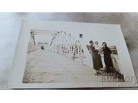 Photo Simeonovgrad Two women and a baby on a bridge over the Maritsa River