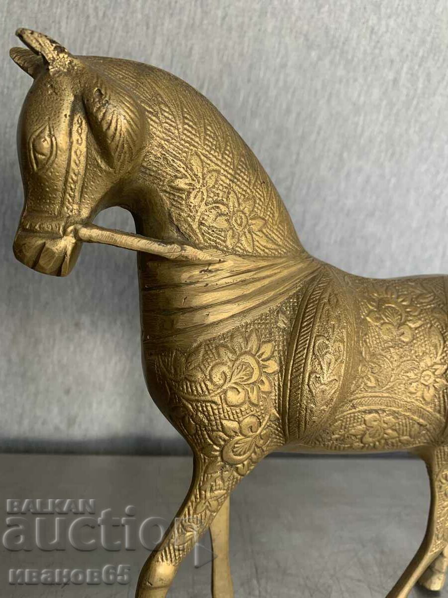 a massive bronze horse