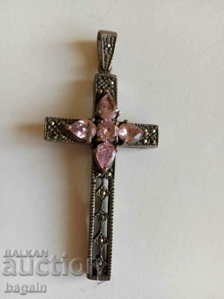 A unique silver cross.