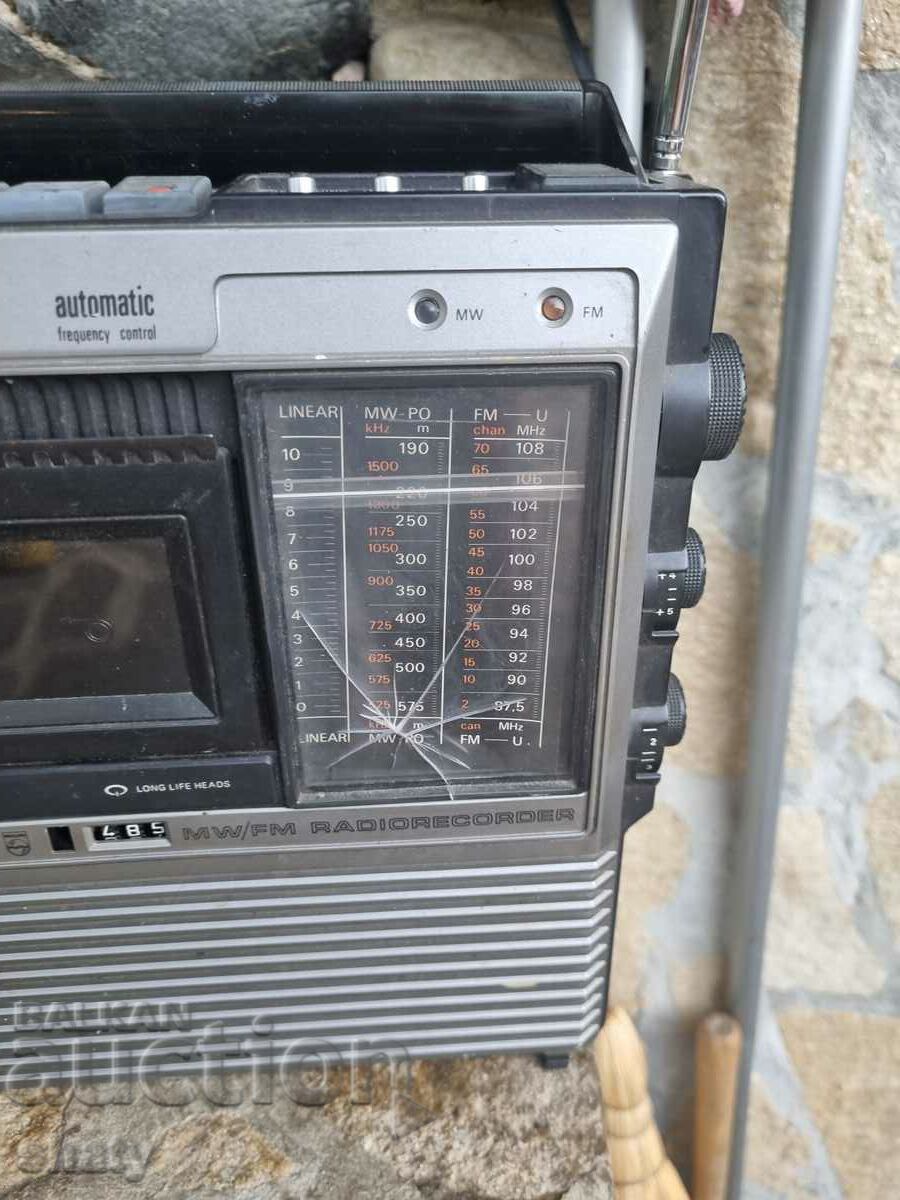 Auction  An old cassette player.