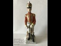 Porcelain soldier figurine with markings