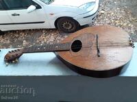 Old antique musical instrument - mandolin