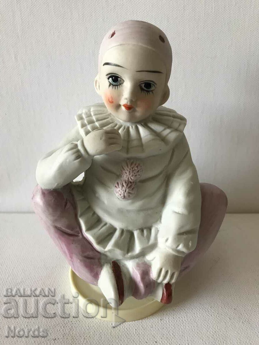 Musical porcelain figurine