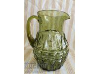 Old colored glass jug