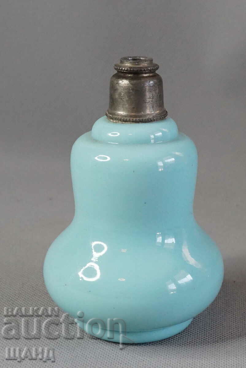 Old glass perfume bottle colored glass