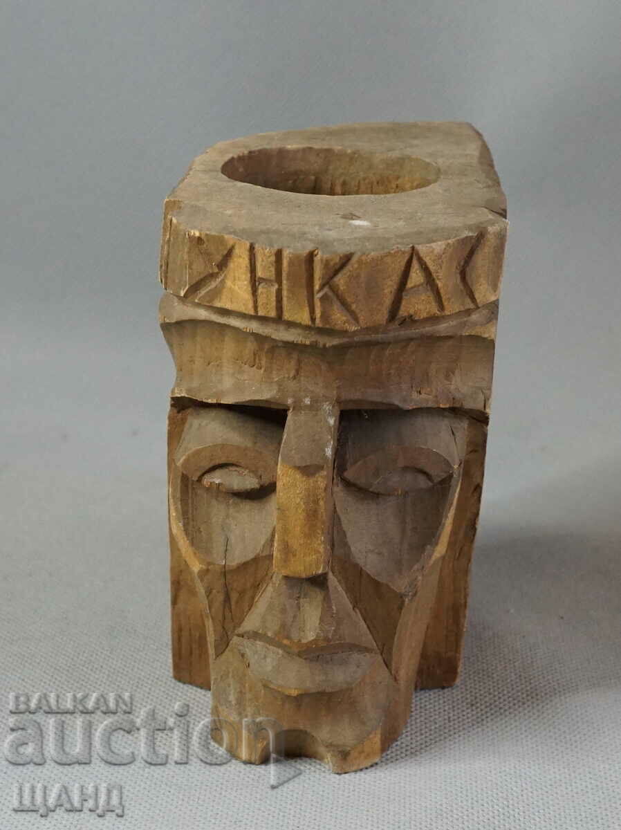 Old wooden figure face