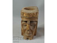 Old wooden figure face