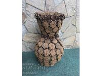 VASE BRAIDED FROM CONES AND BLACK CORD FOR DRIED FLOWERS