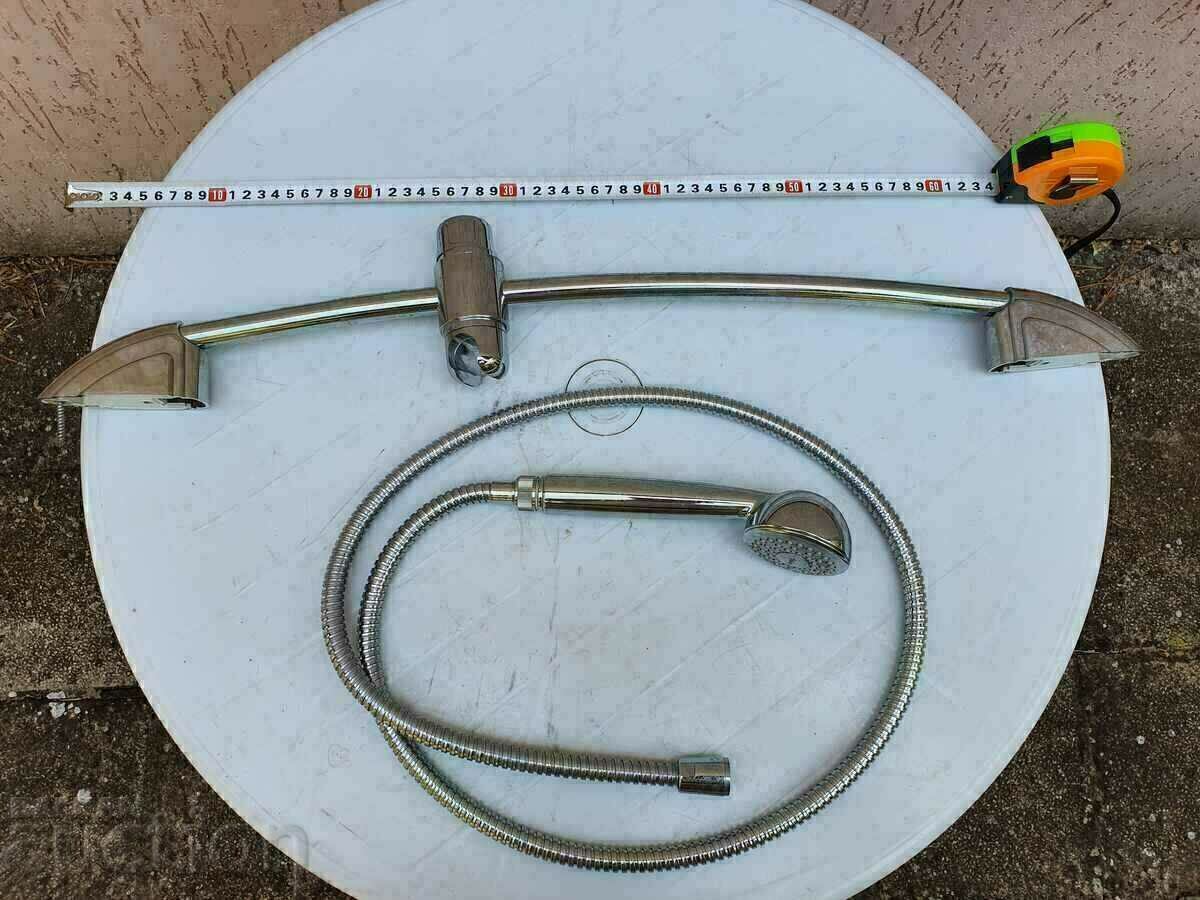 2. I am selling a shower-handset with an extension and a wall holder. BZC - 5