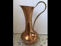 A large copper jug