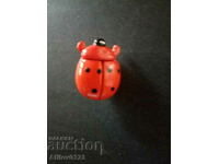 Ladybug badge.