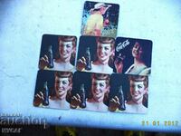 7 pcs OLD COCA COLA CARDBOARD PLATES UNUSED - 2 PERSONS