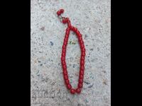 RED ROSARY