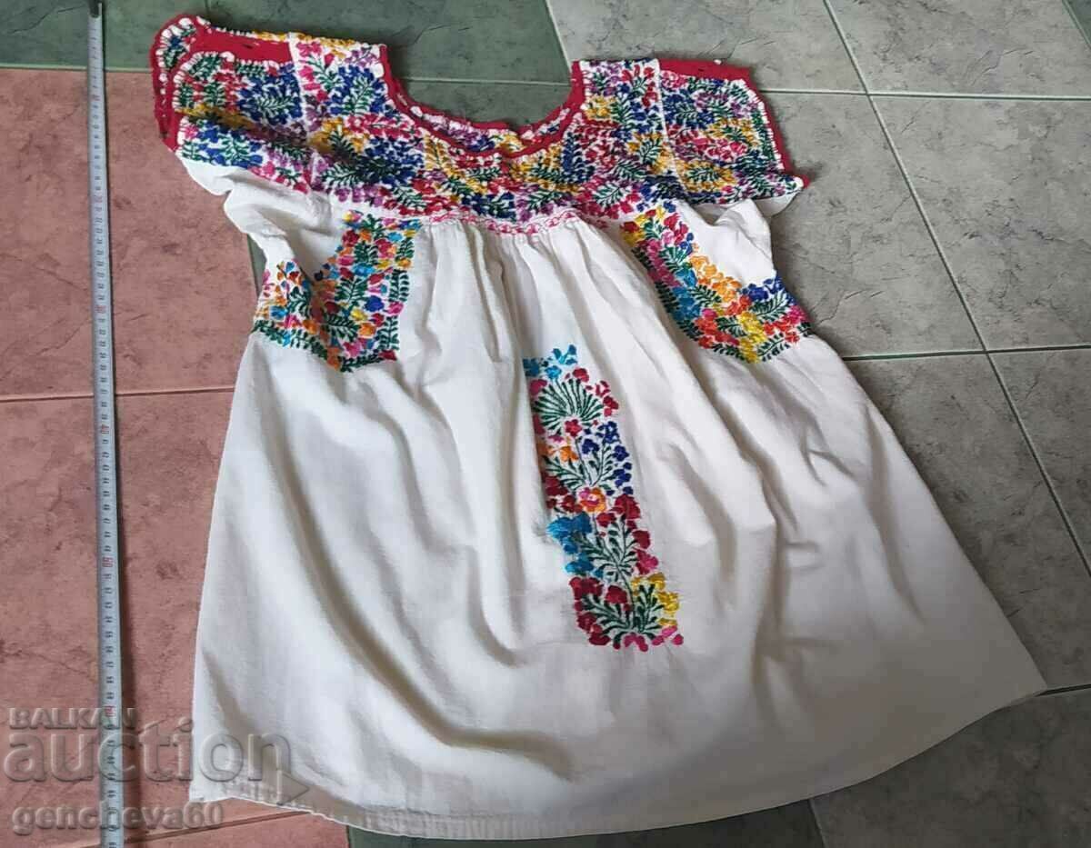 Delivery of Authentic fringed shirt with rich hand embroidery Delivery of Authentic fringed shirt with rich hand embroidery