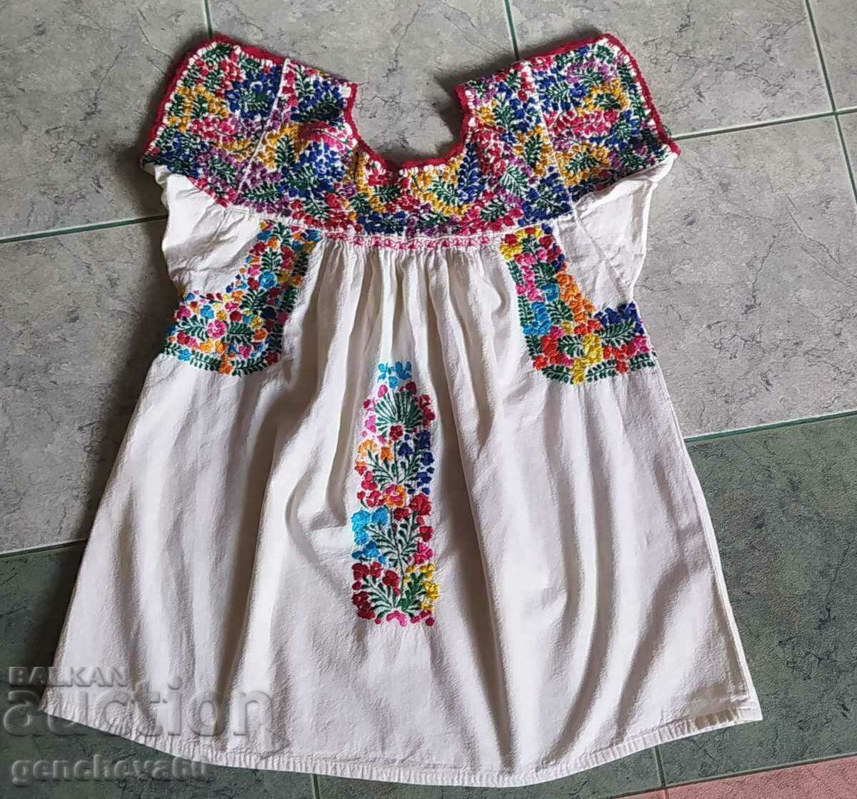 Authentic fringed shirt with rich hand embroidery Authentic fringed shirt with rich hand embroidery