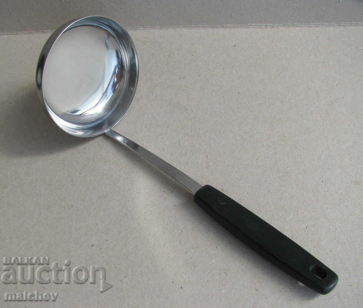 Cooking ladle 27 cm with plastic. handle, preserved