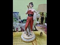 A rare unique antique Capodimonte figure