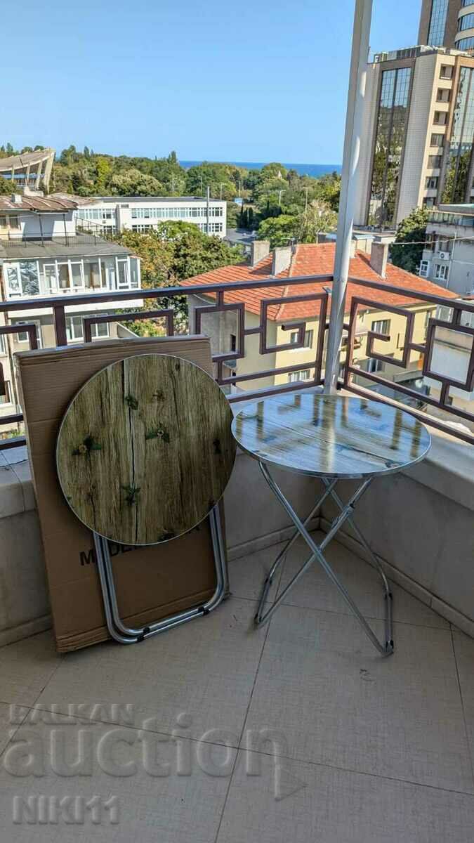 Delivery of Folding round table for terrace, picnic, camping, fishing