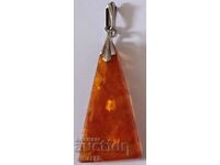 silver pendant with amber