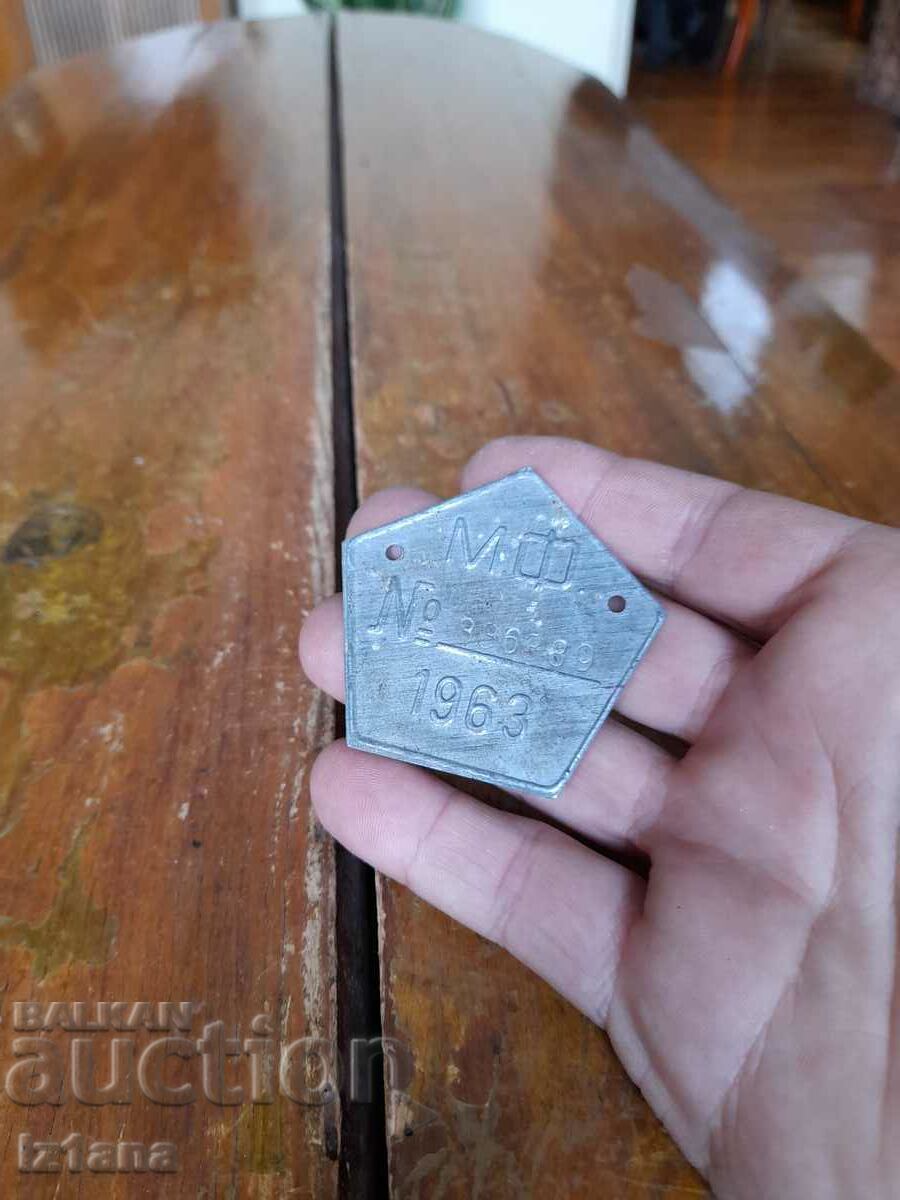 Old license plate, bicycle number, wheel