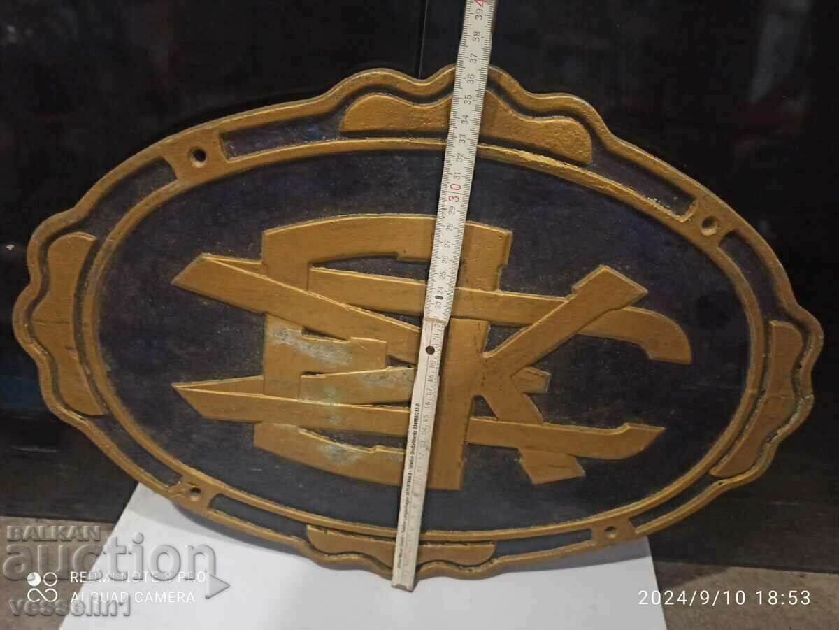 Licitație Placă de metal greu cu o stemă reprezentativă din epoca țaristă Licitație Placă de metal greu cu o stemă reprezentativă din epoca țaristă