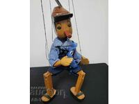 Wooden puppet on threads Pinocchio / Pinocchio