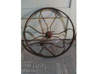 ANTIQUE METAL WHEEL FROM ?