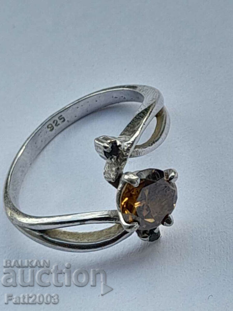 Silver ring with yellow topaz