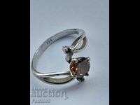 Silver ring with yellow topaz