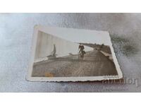 Photo Kardjali A young girl with a bicycle on a bridge over the Arda River