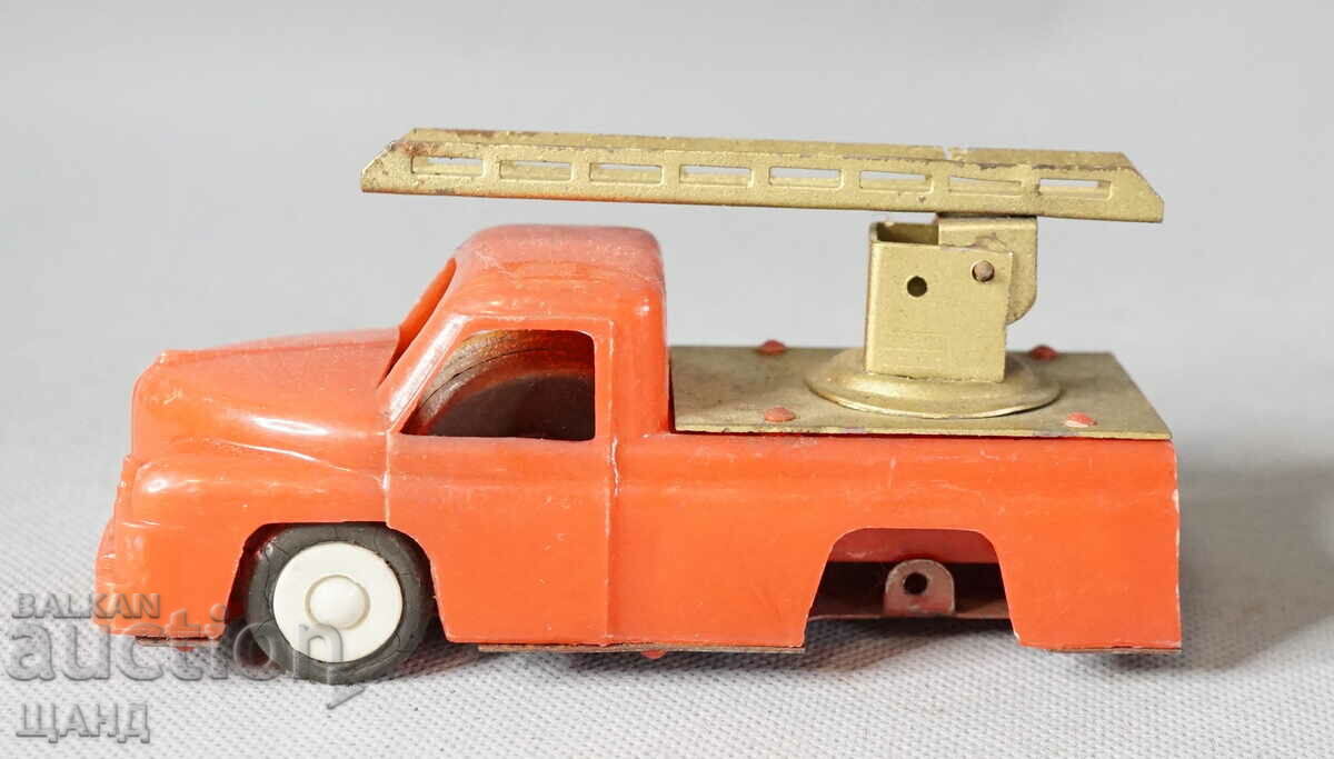 Old plastic toy fire truck model