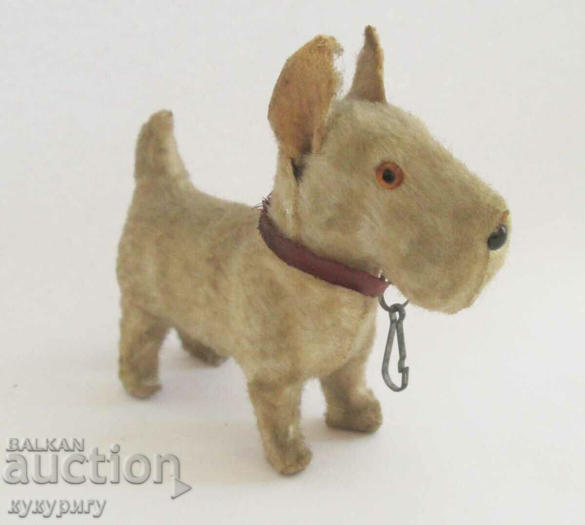 Old small plush toy of a terrier dog with price 25.00 BGN | € 12.78 Old small plush toy of a terrier dog with price 25.00 BGN | € 12.78