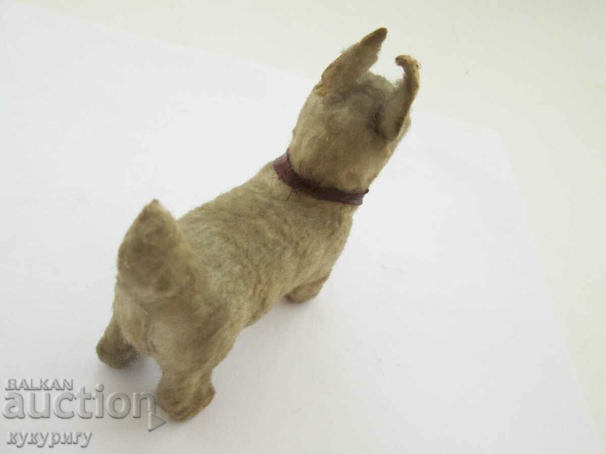Delivery of Old small plush toy of a terrier dog Delivery of Old small plush toy of a terrier dog