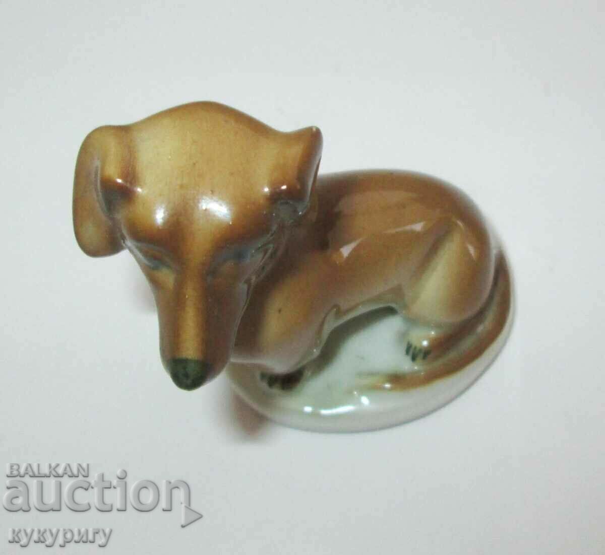Old small porcelain statuette figure of a Dachshund dog with price 30.00 BGN | € 15.34 Old small porcelain statuette figure of a Dachshund dog with price 30.00 BGN | € 15.34
