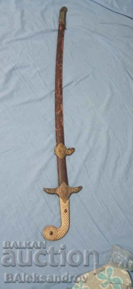 An interesting ceremonial sword with a leather scabbard