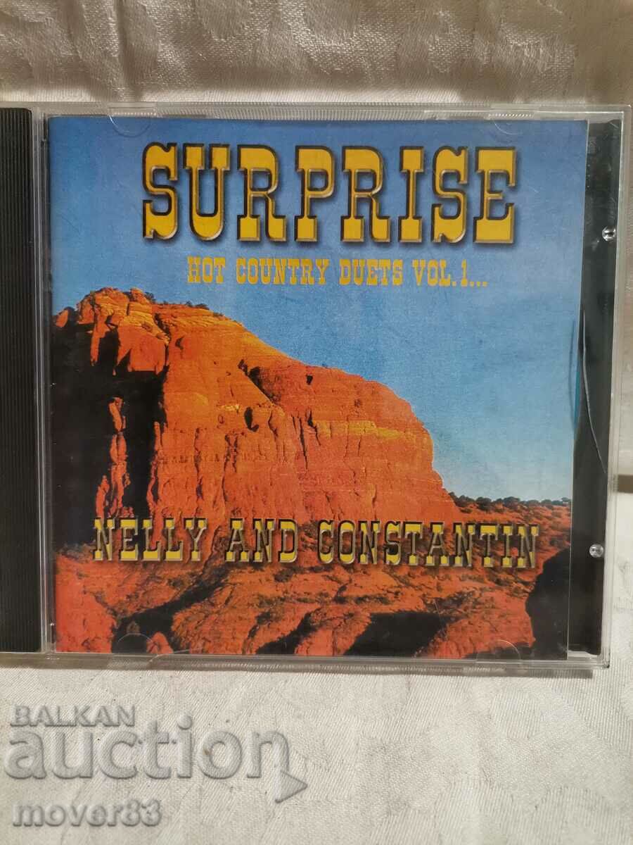 CD cu muzică pe disc. "Surprinde".