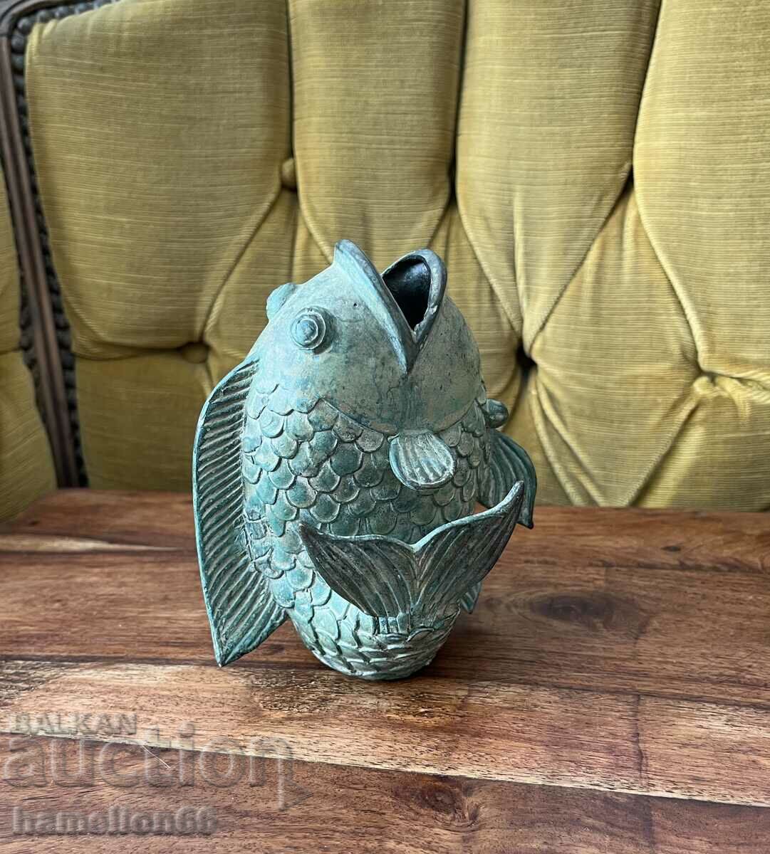 Old bronze sculpture, fish