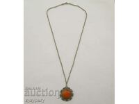 Old necklace locket jewelry pendant with amber