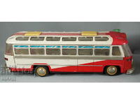 Old metal sheet metal toy model bus battery operated