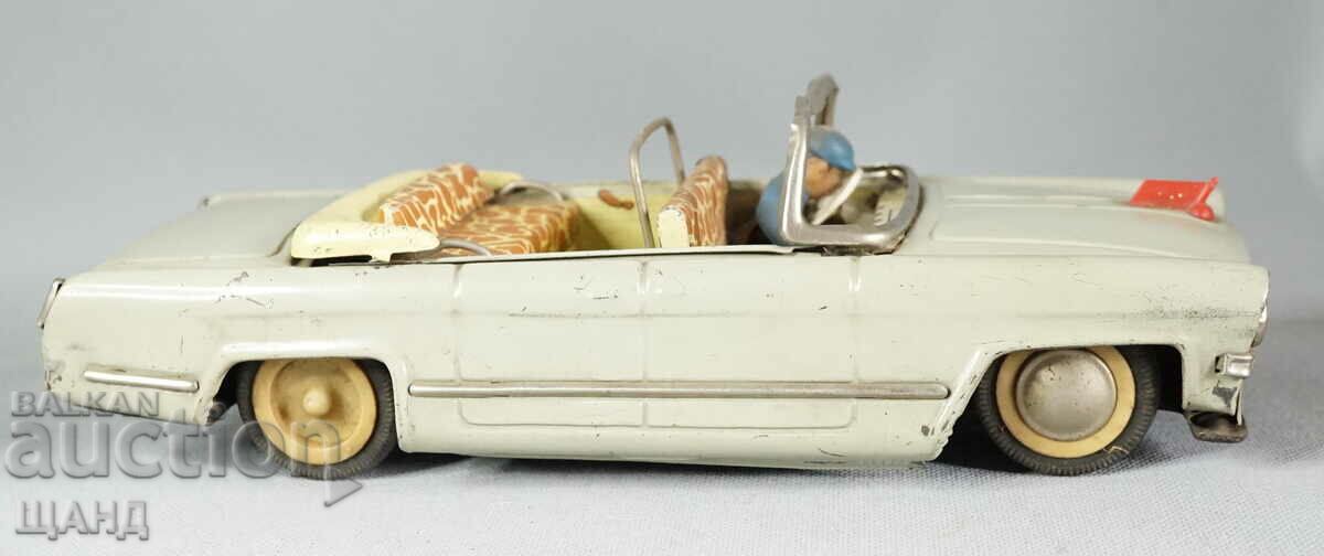 Old Rare metal toy model car convertible and driver