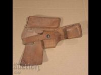 Old pistol holster with magazine clip